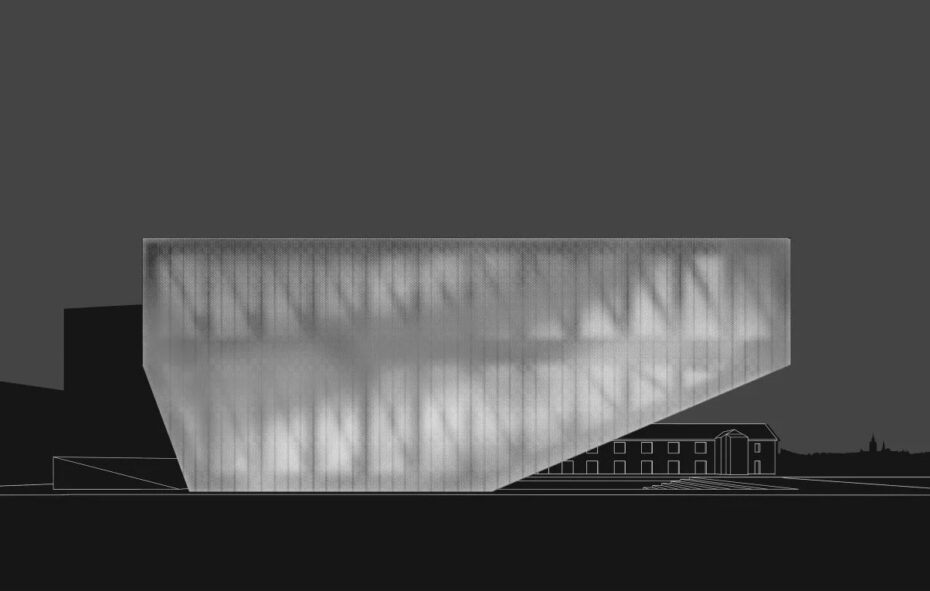 Podświetlona elewacja budynku nocą.