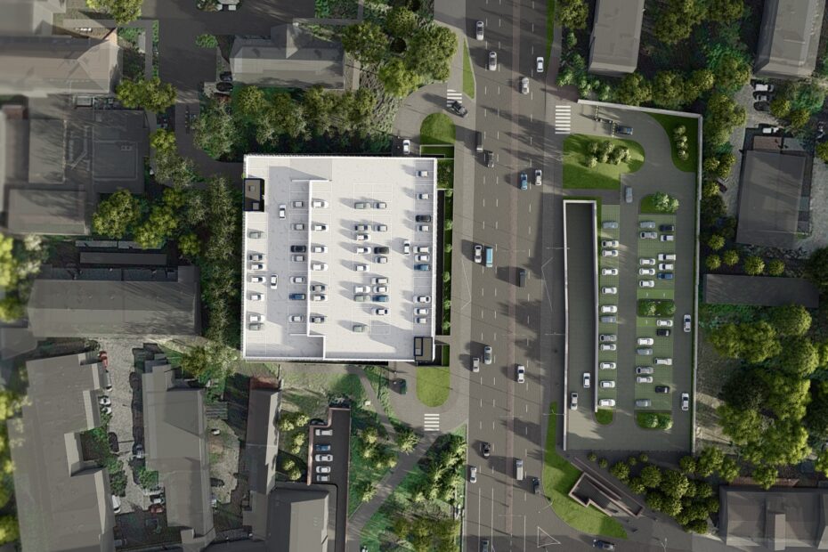 Widok z lotu ptaka na parking między budynkami mieszkalnymi