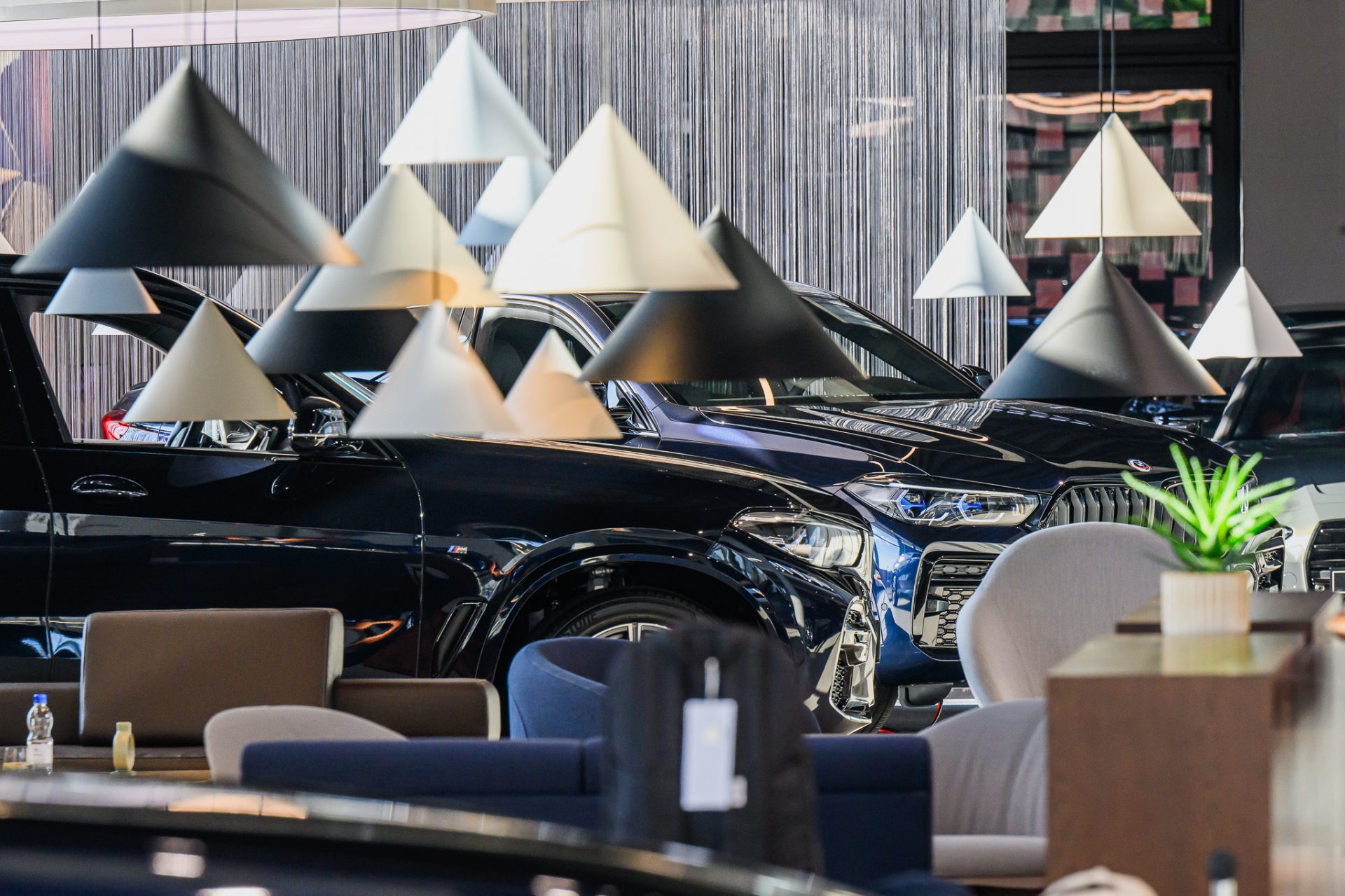 Interior design of a BMW car showroom in the Retail Next standard – lighting detail.