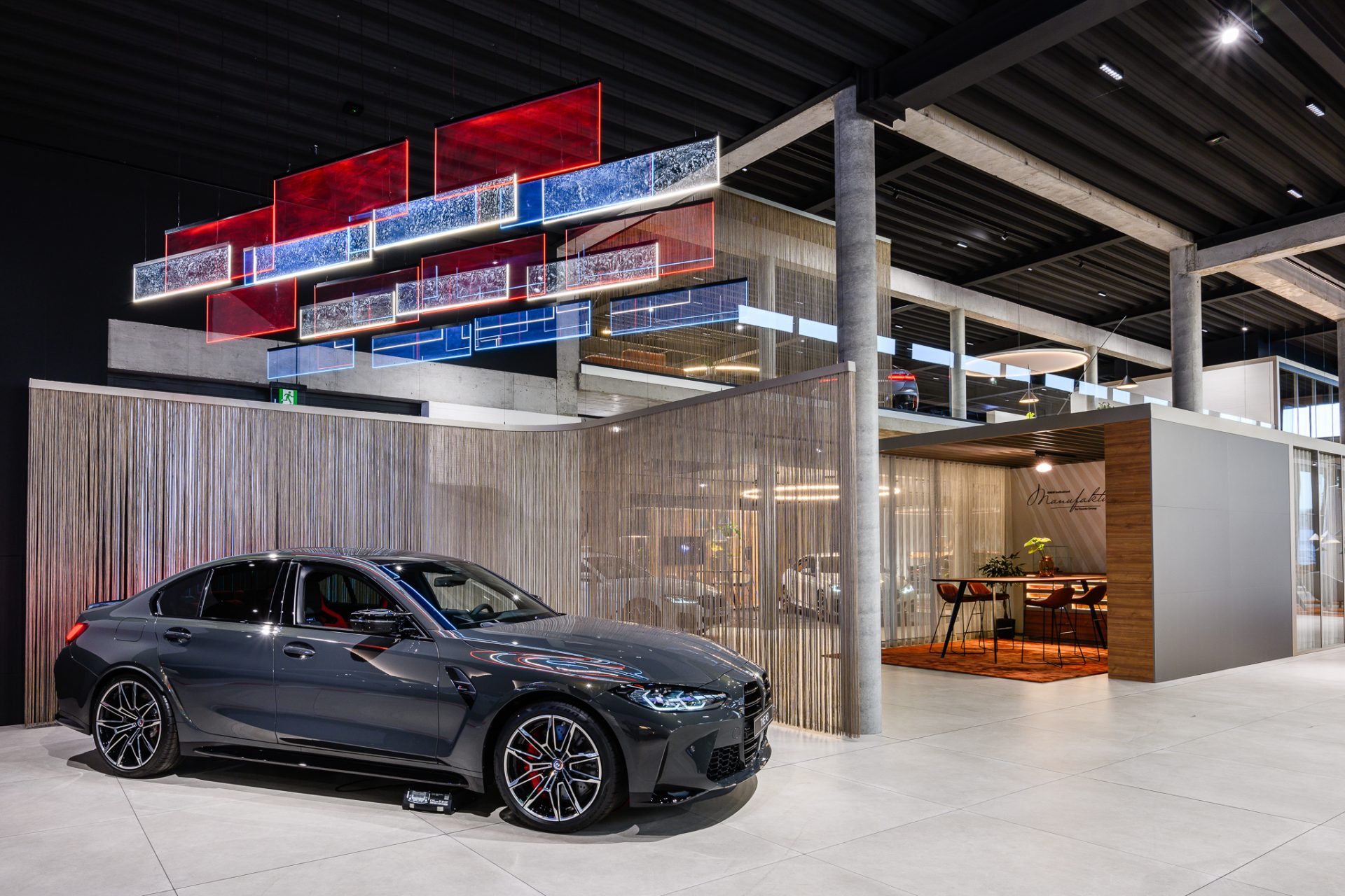 Projekt wnętrza salonu samochodowego BMW w standardzie Retail Next Strefa M