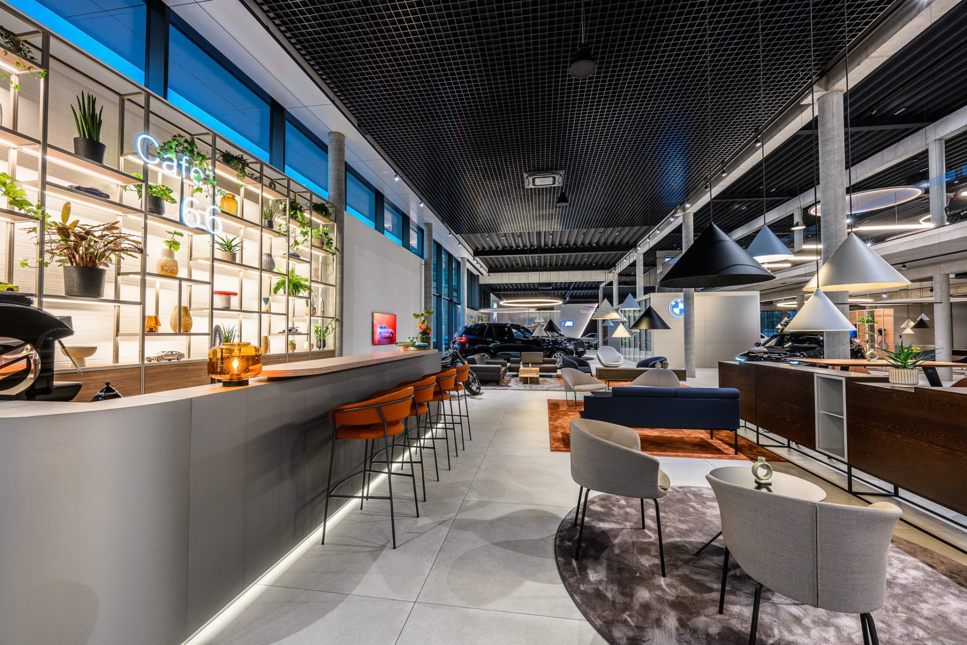 Interior design of a BMW car showroom in the Retail Next standard – bar area.