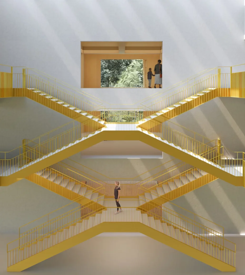 Wnętrze centrum fizjoterapii w Katowicach z trzykondygnacyjną, reprezentacyjną żółtą klatką schodową.